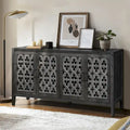 Buffet ancien à quatre portes creuses – Bahut vintage en bois avec portes sculptées de motifs floraux et étagères réglables